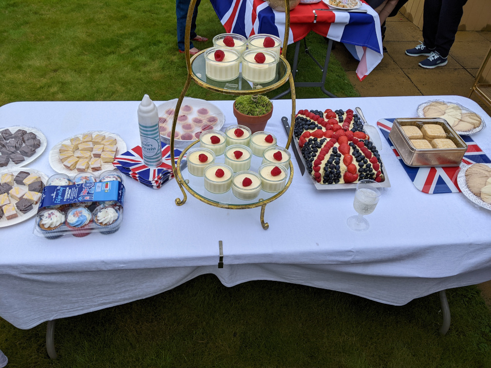 A table laid with sweet things to eat.